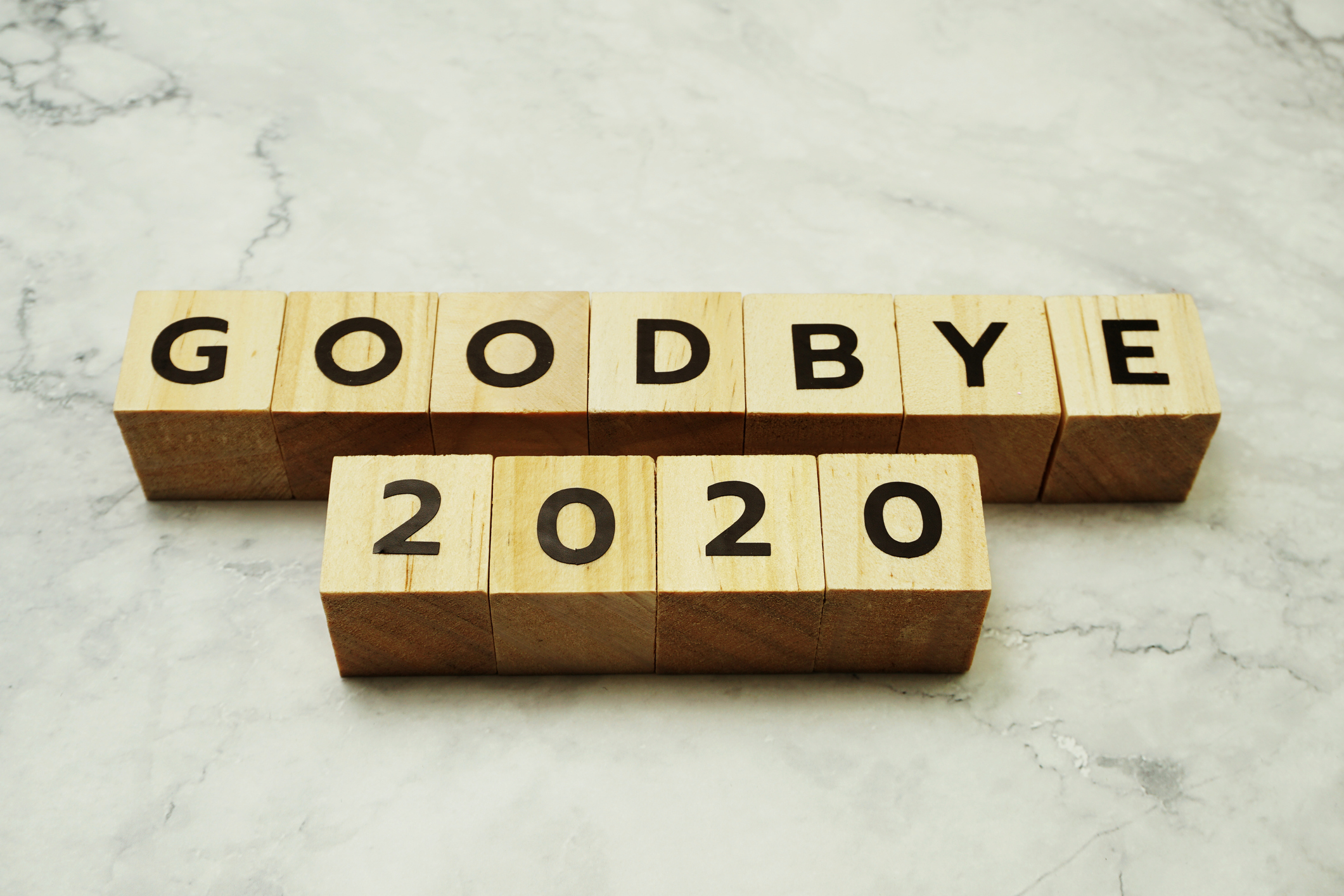 Goodbye 2020 alphabet letters on marble background | Stratosphere