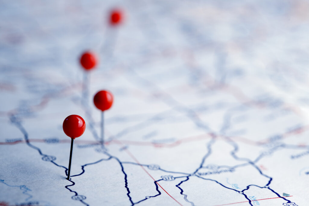 Push Pins On A Map Stock Photo 1024x683 